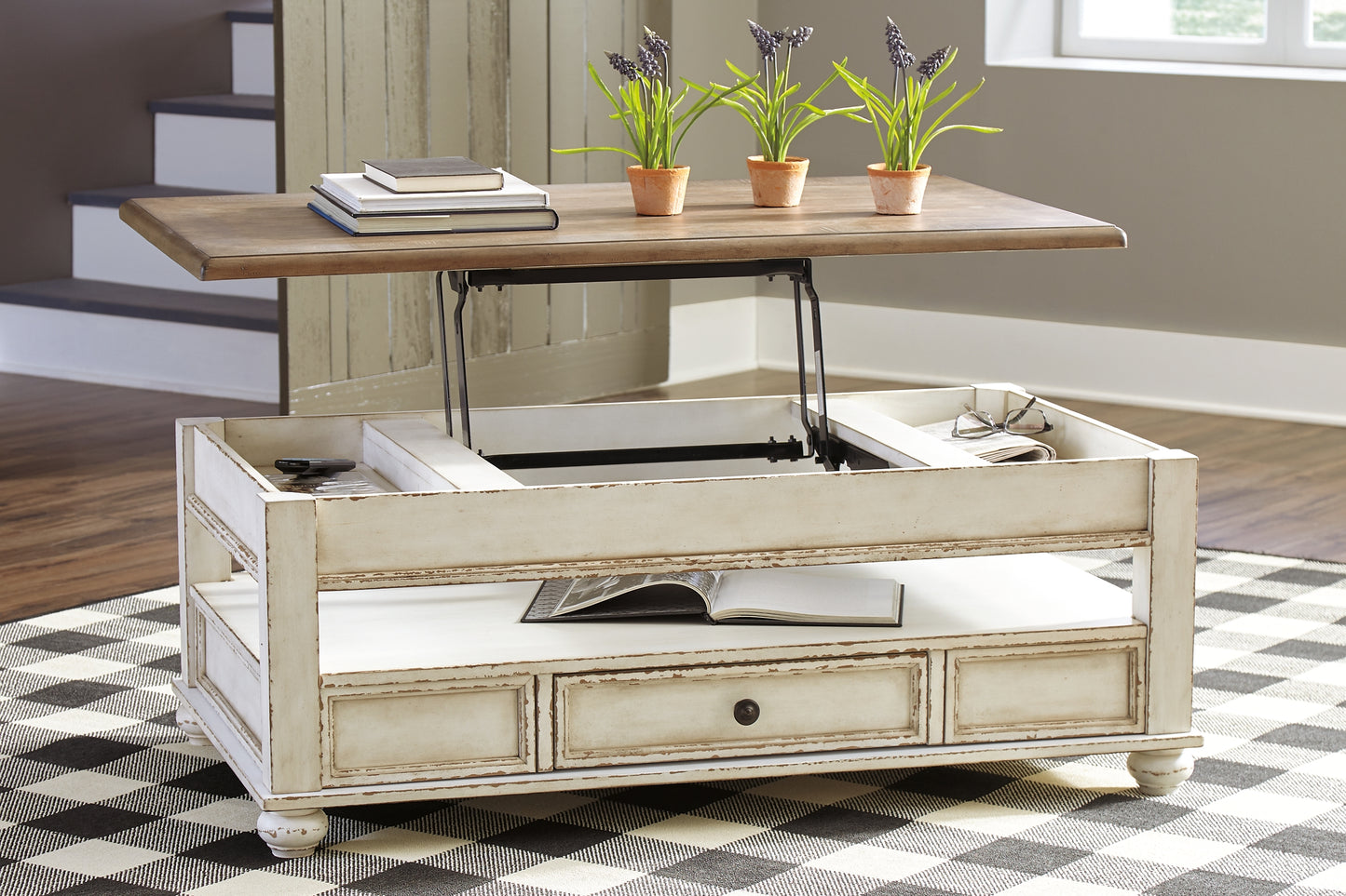 Ashley Express - Mesa de cóctel elevable Realyn