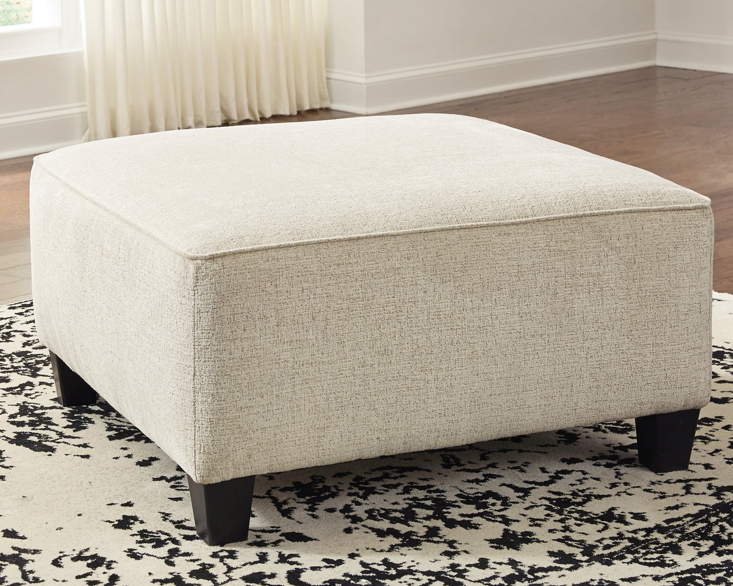 Ashley Express - Otomana extragrande con acento Abinger