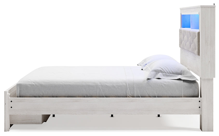 Cama-librería tapizada Altyra con espacio de almacenamiento