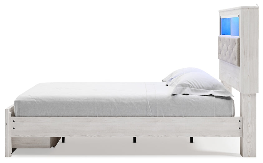 Cama-librería tapizada Altyra con espacio de almacenamiento