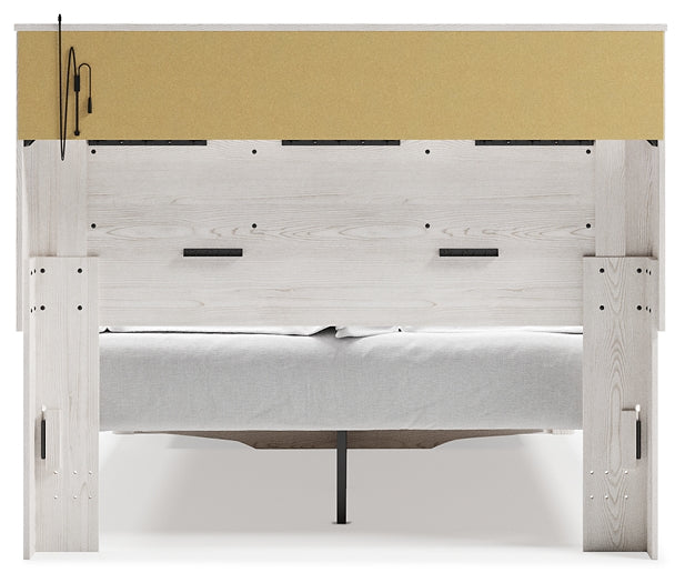 Cama-librería tapizada Altyra con espacio de almacenamiento