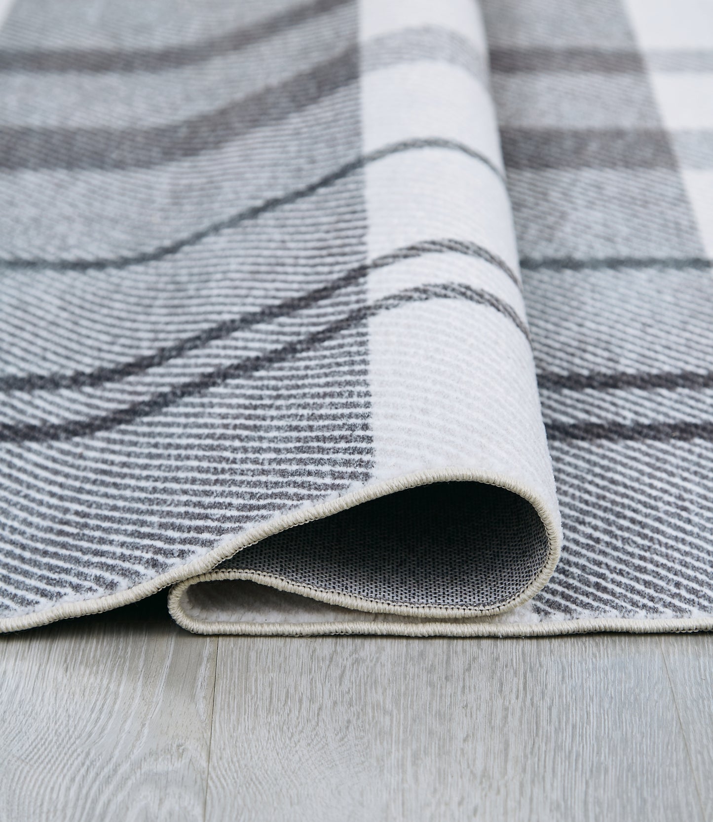 Ashley Express - Alfombra grande lavable Kaidlow
