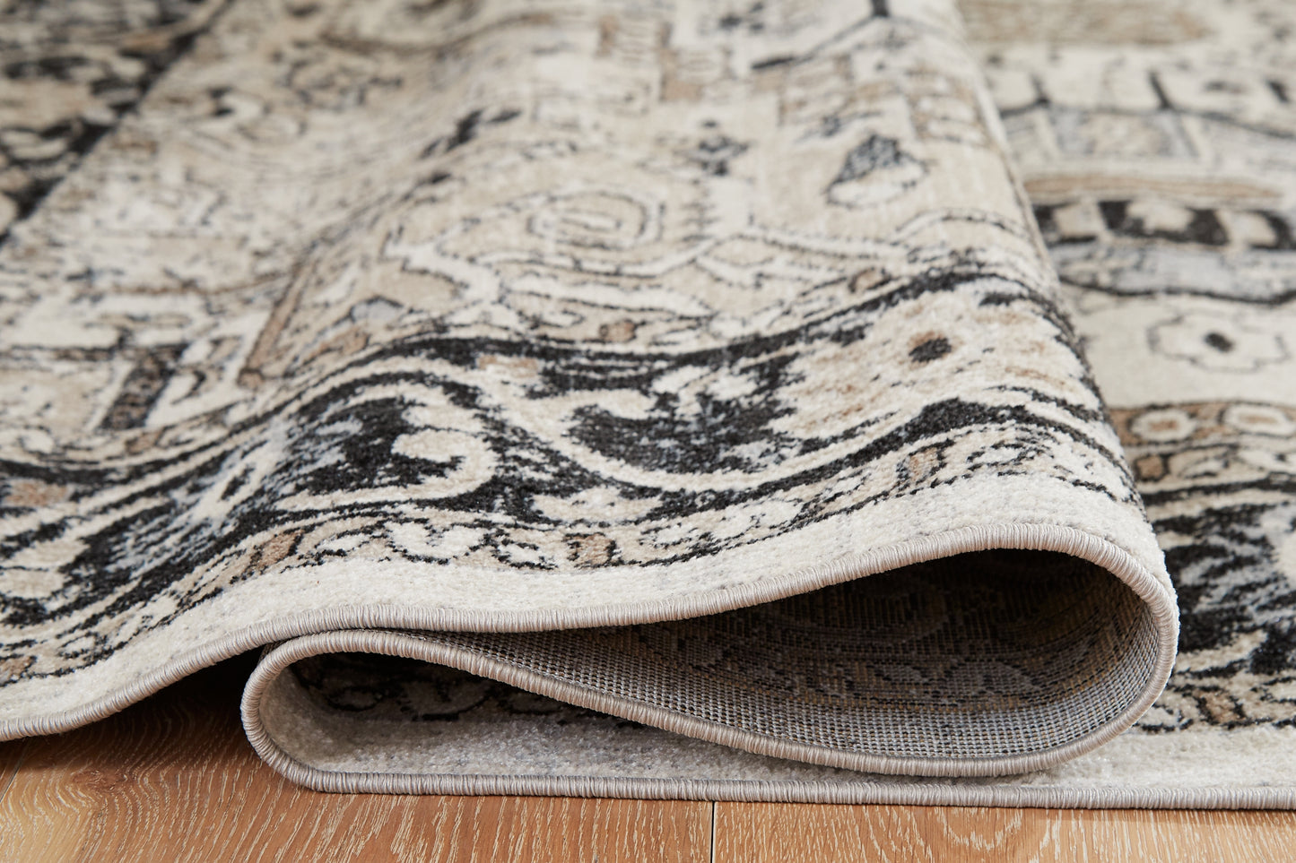 Ashley Express - Alfombra mediana lavable Gregmoore