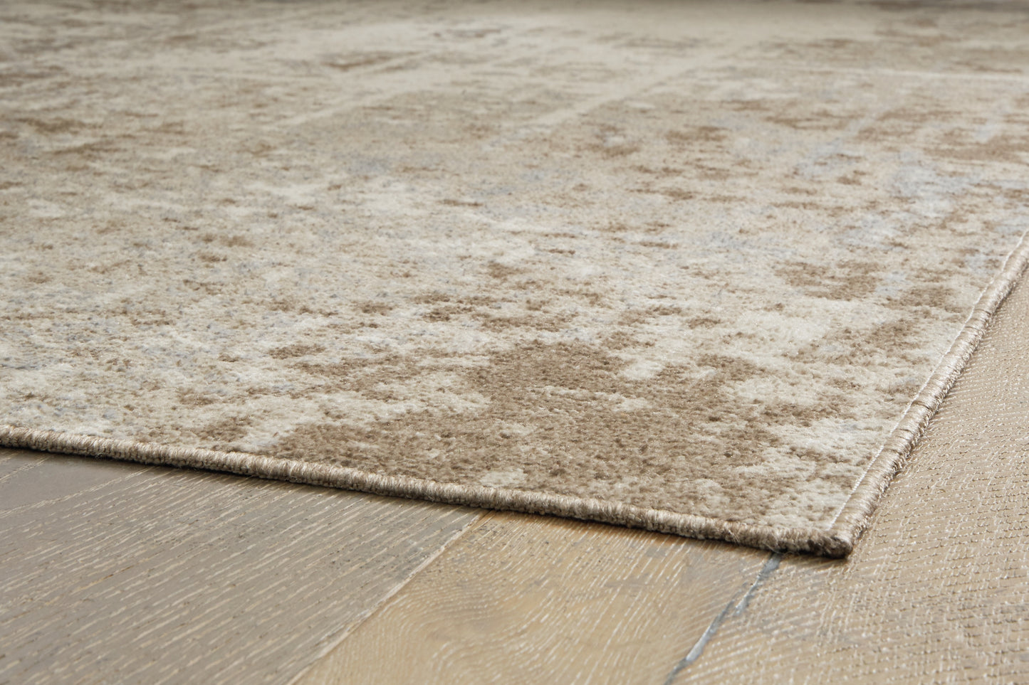 Ashley Express - Alfombra lavable mediana Grifflain