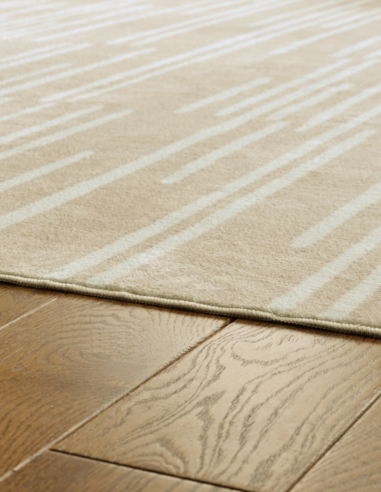 Ashley Express - Alfombra lavable mediana Ardenville