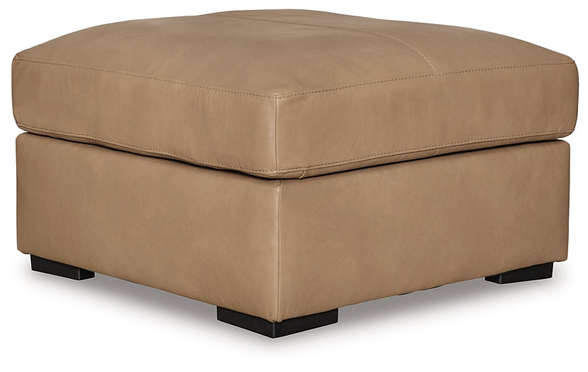 Ashley Express - Otomana Bandon extragrande con acento