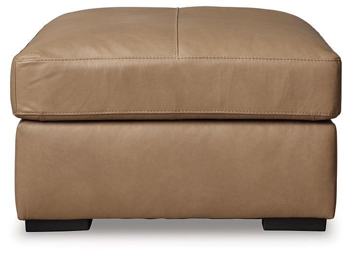 Ashley Express - Otomana Bandon extragrande con acento