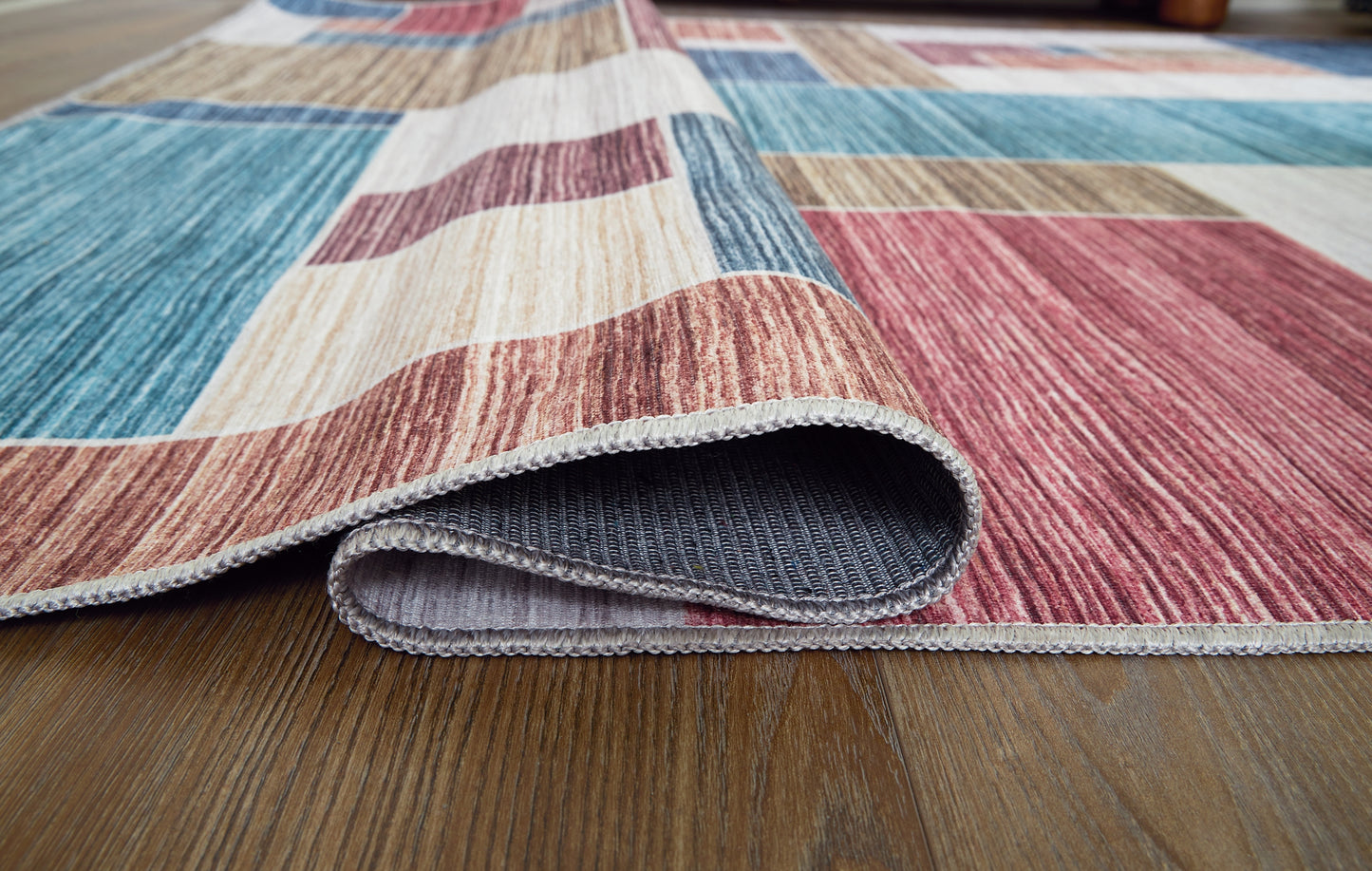 Ashley Express - Alfombra lavable mediana Numore