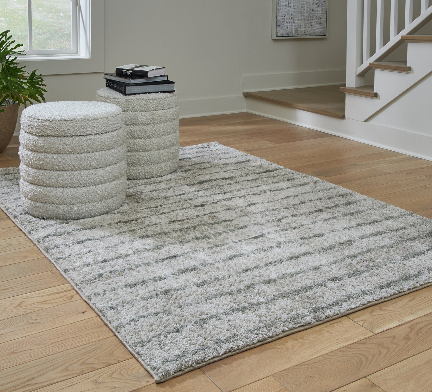 Ashley Express - Alfombra mediana Laddway