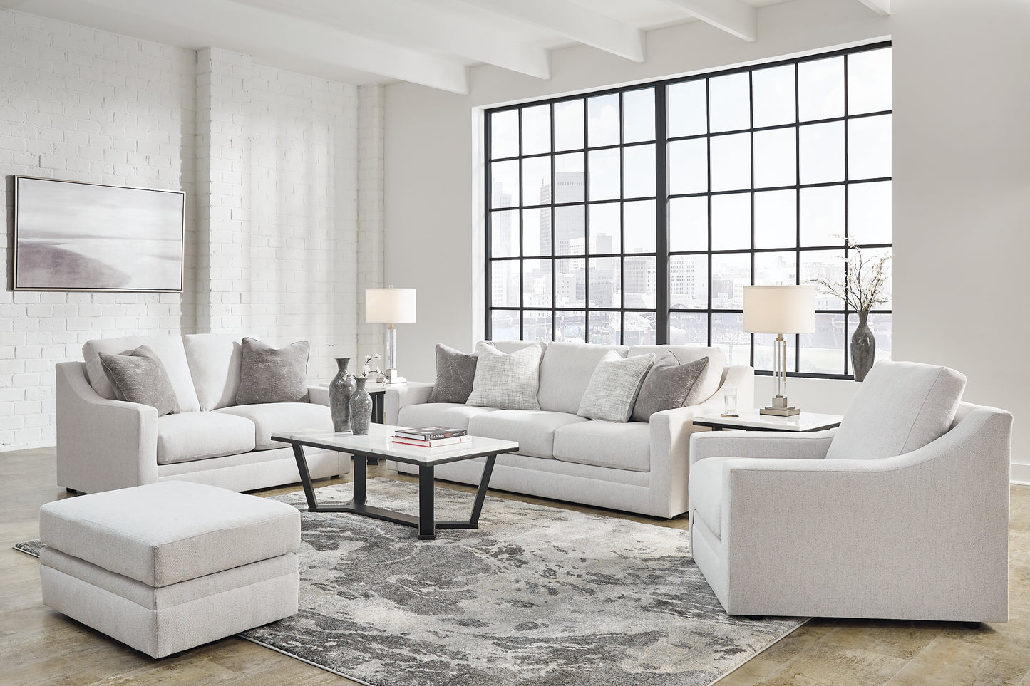 Sofá, loveseat, silla y otomana Maitelynn