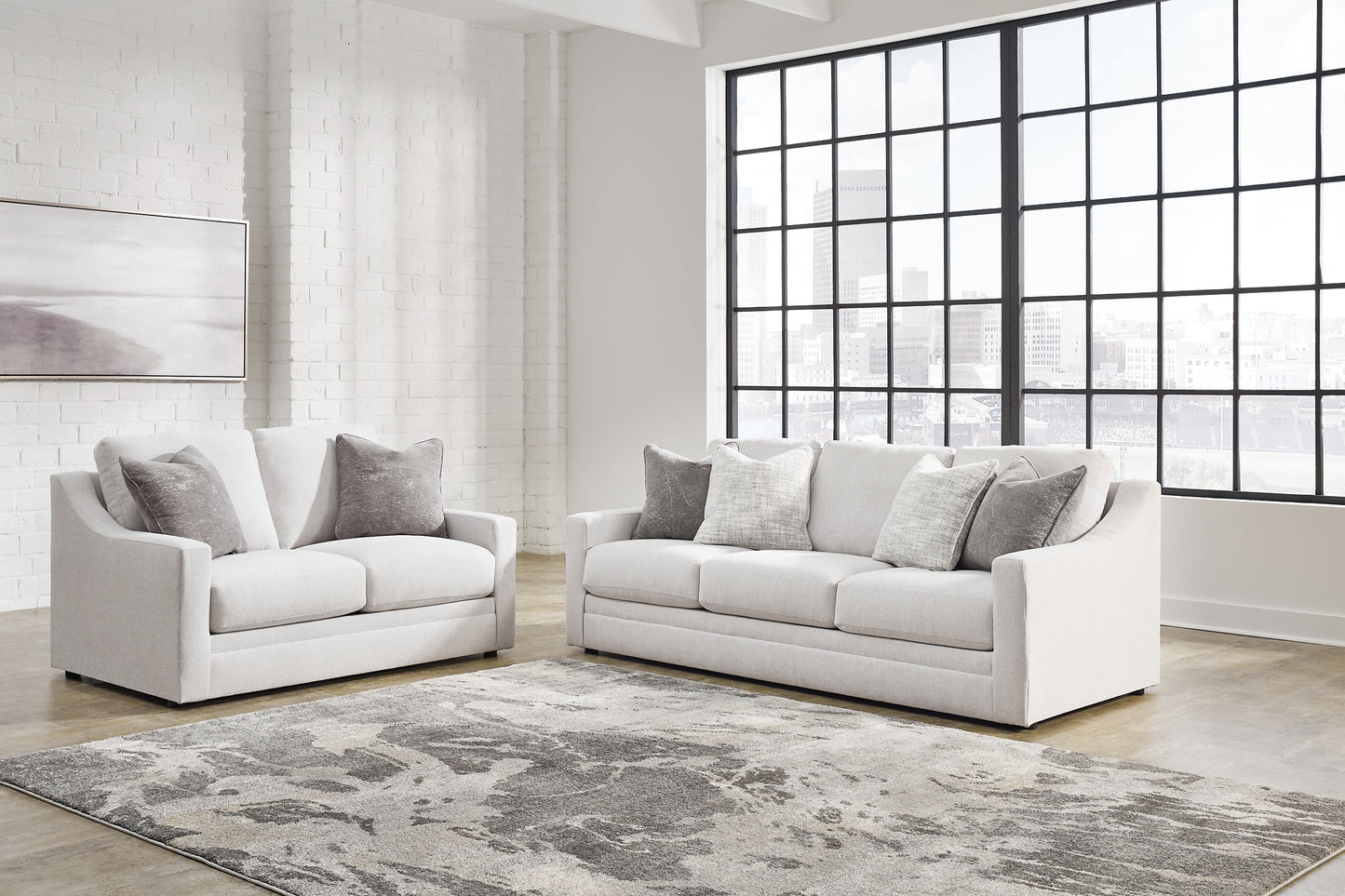 Sofá, loveseat, silla y otomana Maitelynn