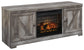 Mueble para TV Wynnlow de 63" con chimenea eléctrica