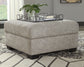 Ashley Express - Otomana Megginson con almacenamiento