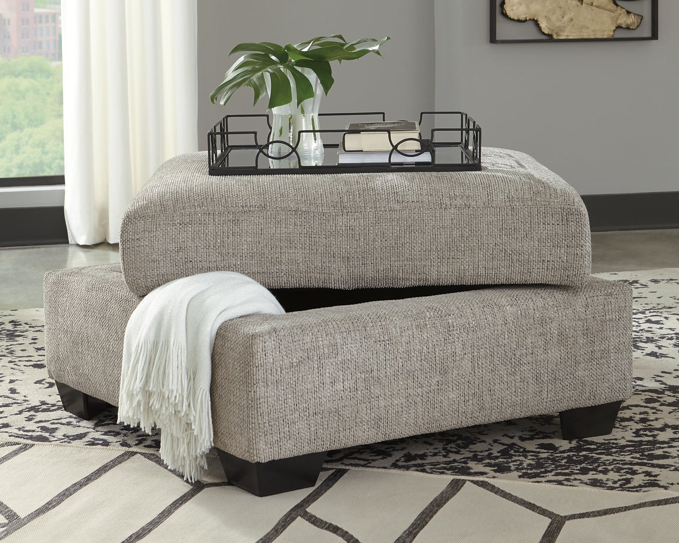 Ashley Express - Otomana Megginson con almacenamiento