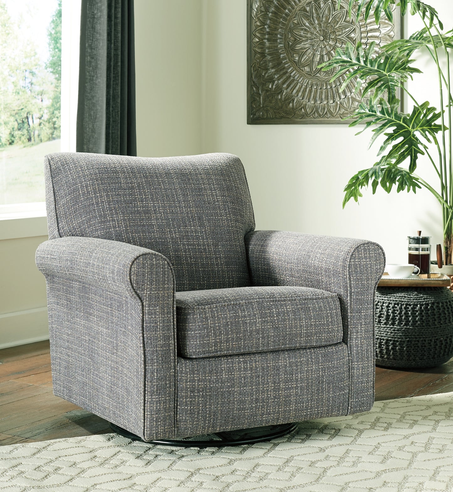 Sillón giratorio con acento deslizante Renley