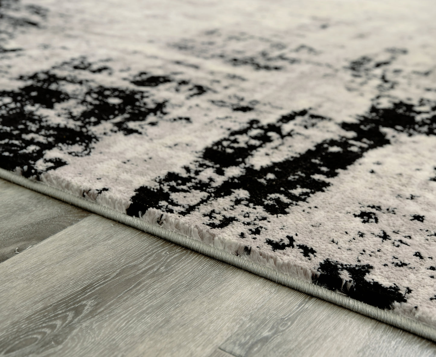 Ashley Express - Alfombra mediana Zekeman