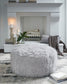 Ashley Express - Otomana extragrande con acento Galice