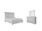 Cama Kanwyn Queen con paneles y tocador con espejo