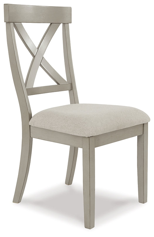 Ashley Express - Mesa de comedor Parellen y 4 sillas