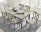 Ashley Express - Mesa de comedor Parellen y 6 sillas