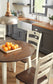 Ashley Express - Mesa de comedor Woodanville y 4 sillas