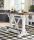 Ashley Express - Mesa de comedor Valebeck de altura de mostrador y 4 taburetes