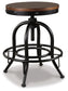 Ashley Express - Mesa de comedor Valebeck de altura de mostrador y 4 taburetes