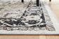Ashley Express - Alfombra mediana lavable Gregmoore