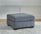 Ashley Express - Otomana extragrande con acento Marleton