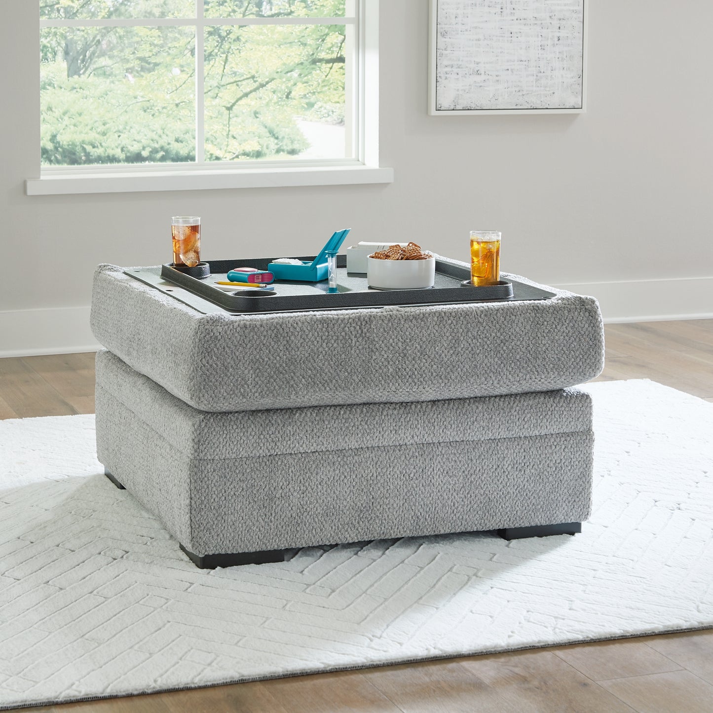 Ashley Express - Otomana Casselbury con almacenamiento