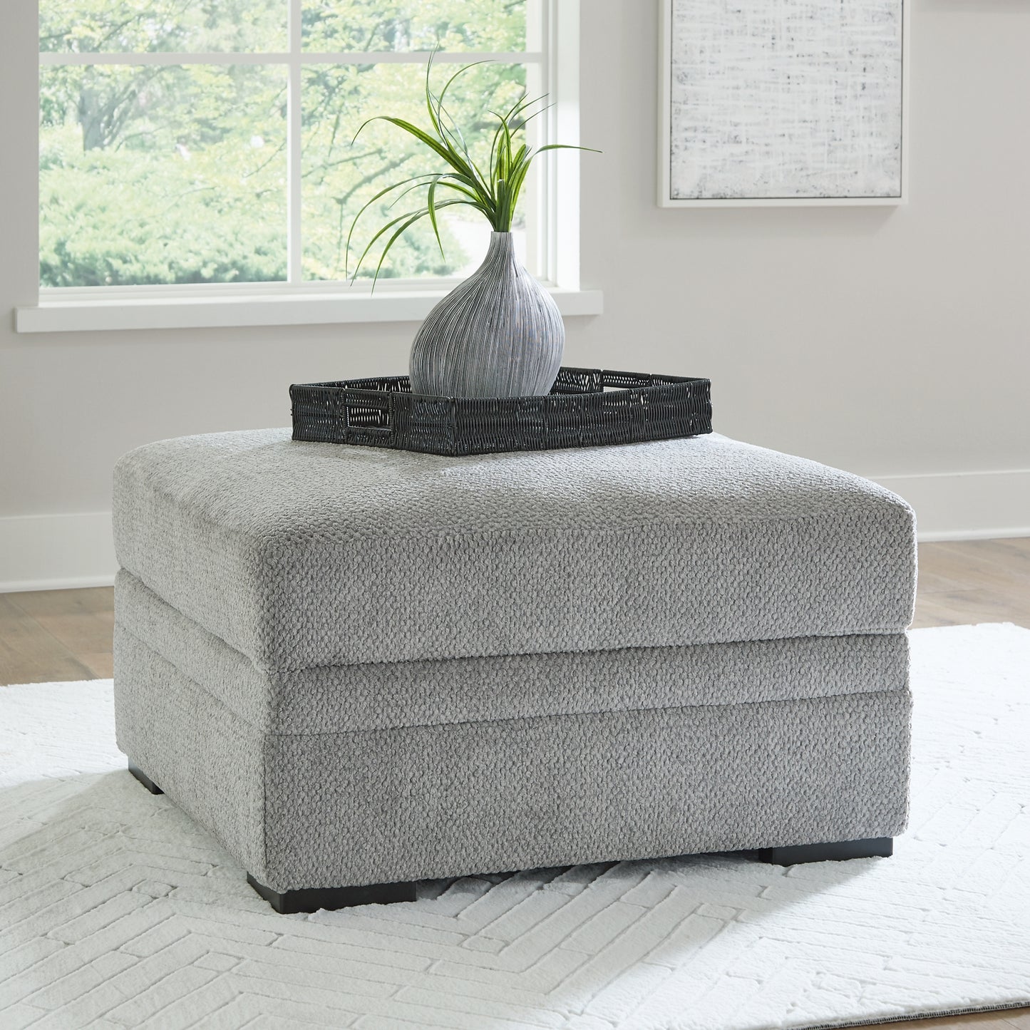 Ashley Express - Otomana Casselbury con almacenamiento