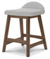 Ashley Express - Mesa de comedor Lyncott de altura de mostrador y 4 taburetes