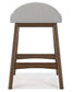 Ashley Express - Mesa de comedor Lyncott de altura de mostrador y 4 taburetes