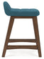 Ashley Express - Mesa de comedor Lyncott de altura de mostrador y 4 taburetes