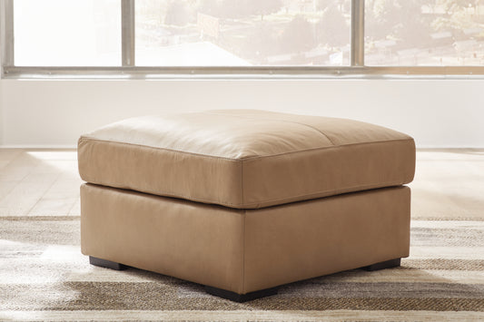 Ashley Express - Otomana Bandon extragrande con acento