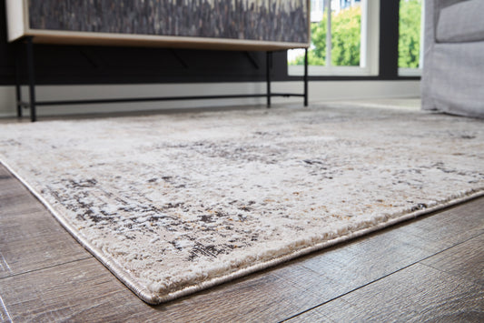 Ashley Express - Alfombra mediana Elaning