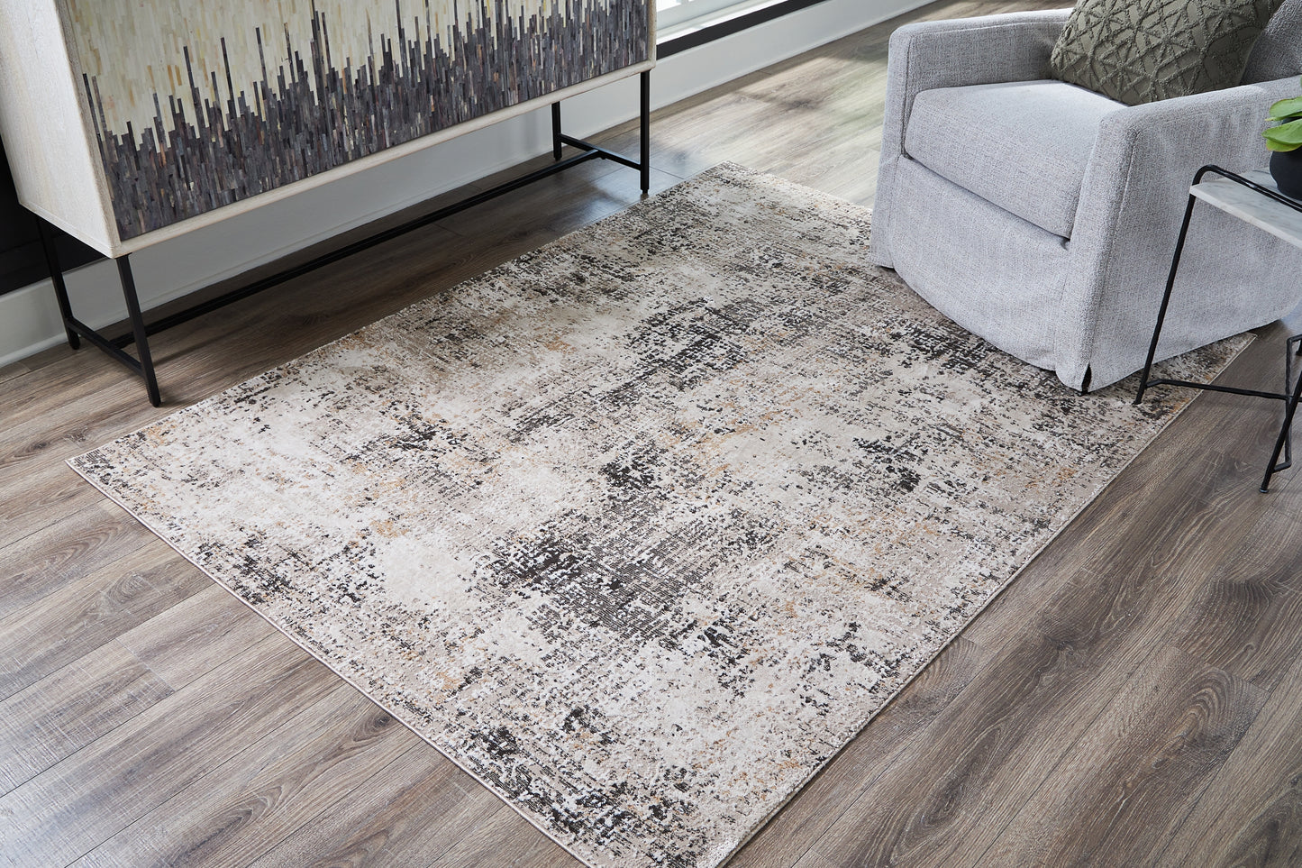Ashley Express - Alfombra mediana Elaning