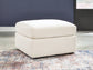 Ashley Express - Otomana extragrande con acento Modmax