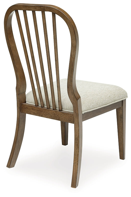 Mesa de comedor Sturlayne y 8 sillas