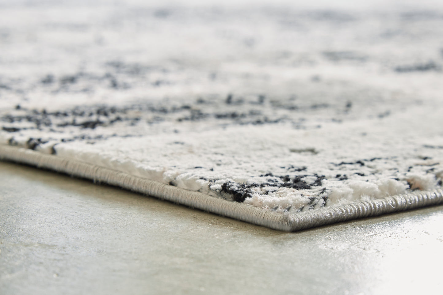 Ashley Express - Alfombra mediana Langwell