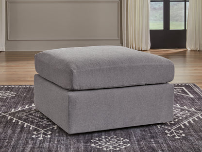 Ashley Express - Otomana extragrande con acento Modmax