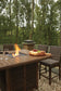 Mesa de comedor exterior Paradise Trail de altura alta con 4 taburetes