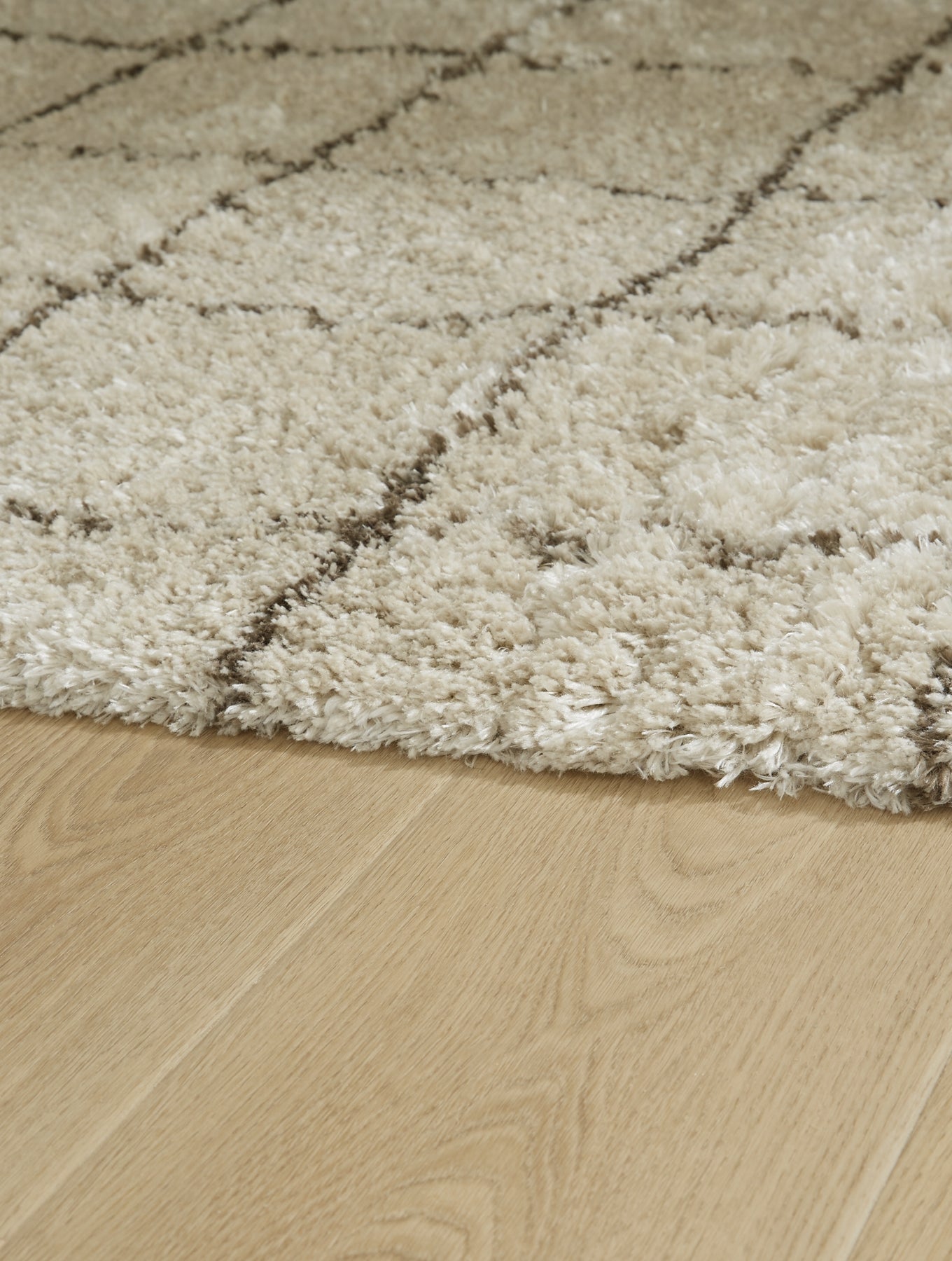 Ashley Express - Alfombra mediana Wrenlow