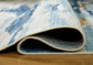 Ashley Express - Alfombra lavable mediana Hessland