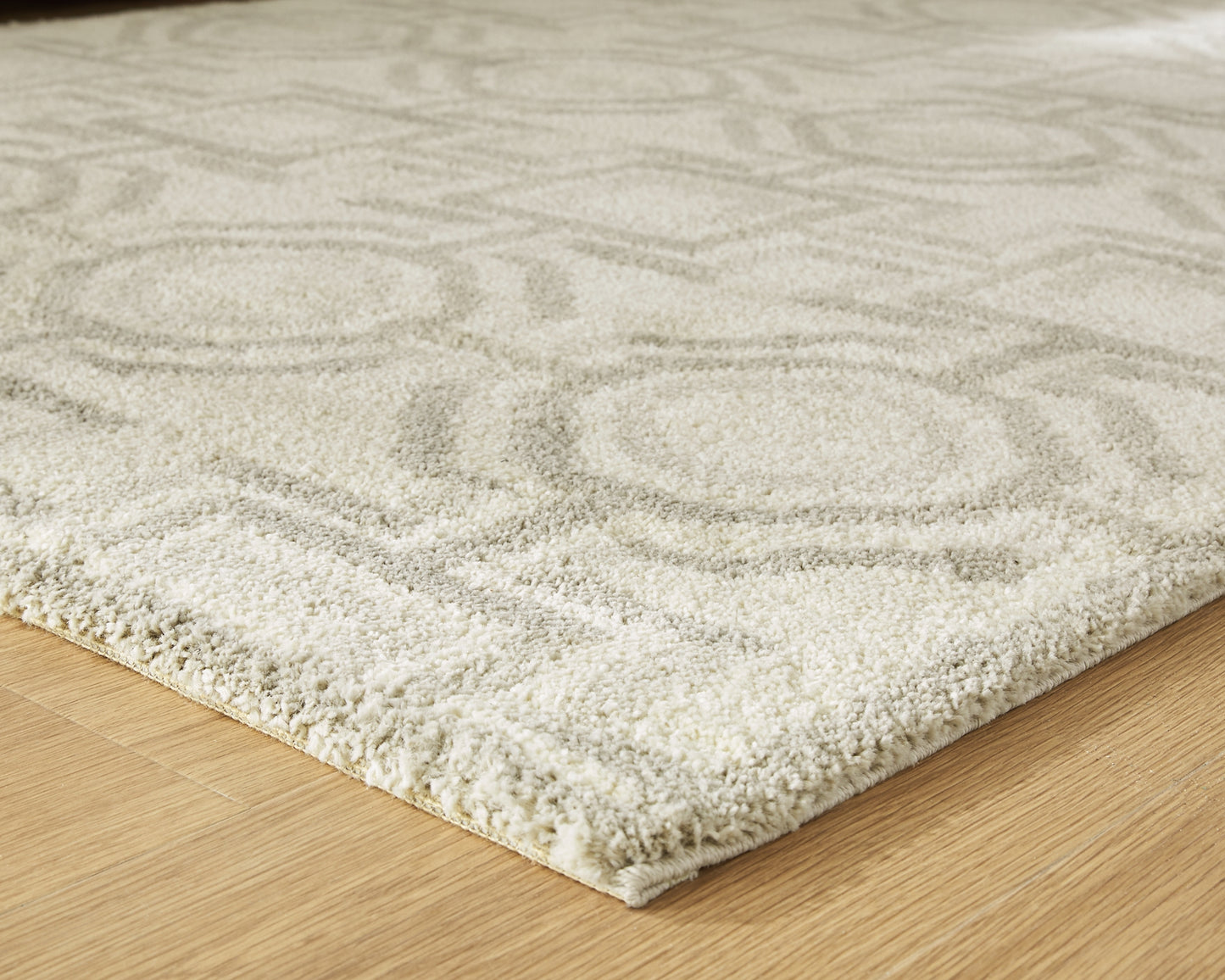 Ashley Express - Alfombra mediana Maconville
