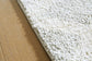 Ashley Express - Alfombra mediana Unawick