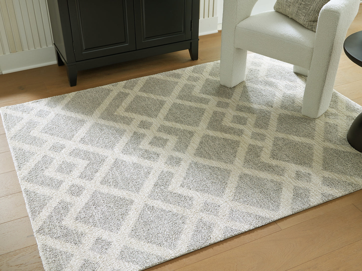 Ashley Express - Alfombra mediana Unawick