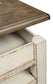 Ashley Express - Mesa de cóctel elevable Realyn