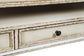 Ashley Express - Mesa de cóctel elevable Realyn