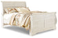 Cama Willowton Queen tipo trineo con tocador con espejo